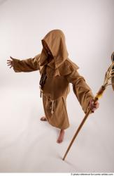 JOEL_ADAMSON STANDING POSE WITH A MAGIC STICK